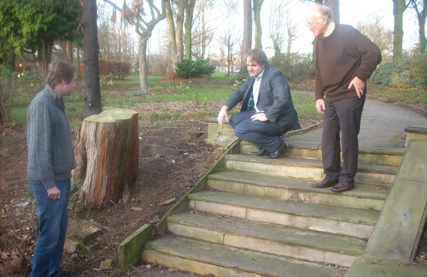 Gareth, Robert and Bob inspecting the old steps, which need to be repaired 