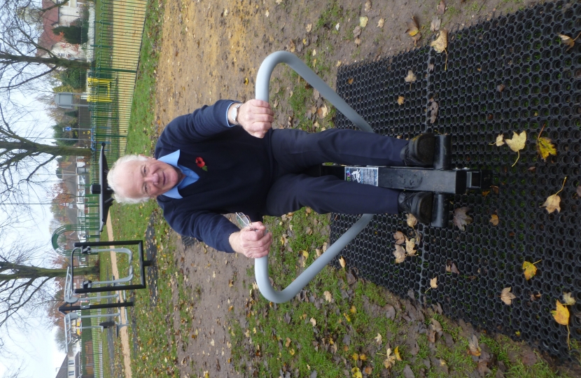 Bob hard at work testing the new rowing machine in the gym section of the park